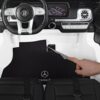 Дитячий двомісний повнопривідний електромобіль Bambi Mercedes AMG G63 (MP3) з ручкою для транспортування, білий