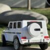 Дитячий повнопривідний електромобіль Bambi Mercedes-Benz AMG G500 (MP3) з додатковими коліщатками, білий