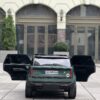 Дитячий двомісний повнопривідний електромобіль Range Rover (MP3)з ручкою для транспортування та автофарбуванням, зелений