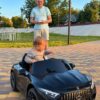 Дитячий двомісний повнопривідний електромобіль Mercedes-Benz AMG SL63 (MP3) з додатковими коліщадками та автофарбуванням, чорний