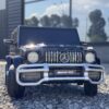 Дитячий двомісний повнопривідний електромобіль Bambi Mercedes AMG G63 (MP3) з ручкою для транспортування та автофарбуванням, чорний