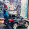 Дитячий повнопривідний електромобіль Bambi Mercedes Biturbo Sport (MP3) з ручкою для транспортування та автофарбуванням, чорний