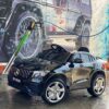 Дитячий повнопривідний електромобіль Bambi Mercedes Biturbo Sport (MP3) з ручкою для транспортування та автофарбуванням, чорний