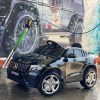 Дитячий повнопривідний електромобіль Bambi Mercedes Biturbo Sport (MP3) з ручкою для транспортування та автофарбуванням, чорний
