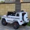 Дитячий електромобіль Bambi Mercedes G63 AMG (MP3) з ручкою для транспортування, білий