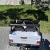 Дитячий двомісний повнопривідний електромобіль Bambi Toyota Land Cruiser (MP3) з ручкою для транспортування та багажником, білий