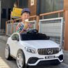 Дитячий повнопривідний електромобіль Bambi Mercedes Biturbo Sport (MP3) з ручкою для транспортування, білий