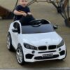 Дитячий повнопривідний електромобіль Bambi BMW Biturbo V8 (MP3) з ручкою для транспортування, білий