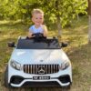 Дитячий повнопривідний електромобіль Bambi Mercedes Biturbo Sport (MP3) з ручкою для транспортування, білий