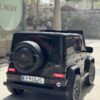 Дитячий двомісний повнопривідний електромобіль Mercedes G63 з автофарбуванням, до 80 кг, чорний