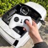 Дитячий двомісний повнопривідний електромобіль Bambi Range Rover (MP3) з ручкою для транспортування, білий