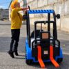 Дитячий електротранспорт Навантажувач Bambi FORKLIFT MX 638 (MP3) з вантажними вилами та багажником, синій