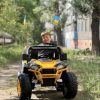 Дитячий Bambi Buggi повнопривідний з прапорцями, жовтий