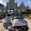 Дитячий електроскутер з додатковими колыщатками та мёяким сидынням, сіро-зелений