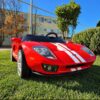 Дитячий електромобіль Bambi Ford зі спойлером та пультом керування, червоний