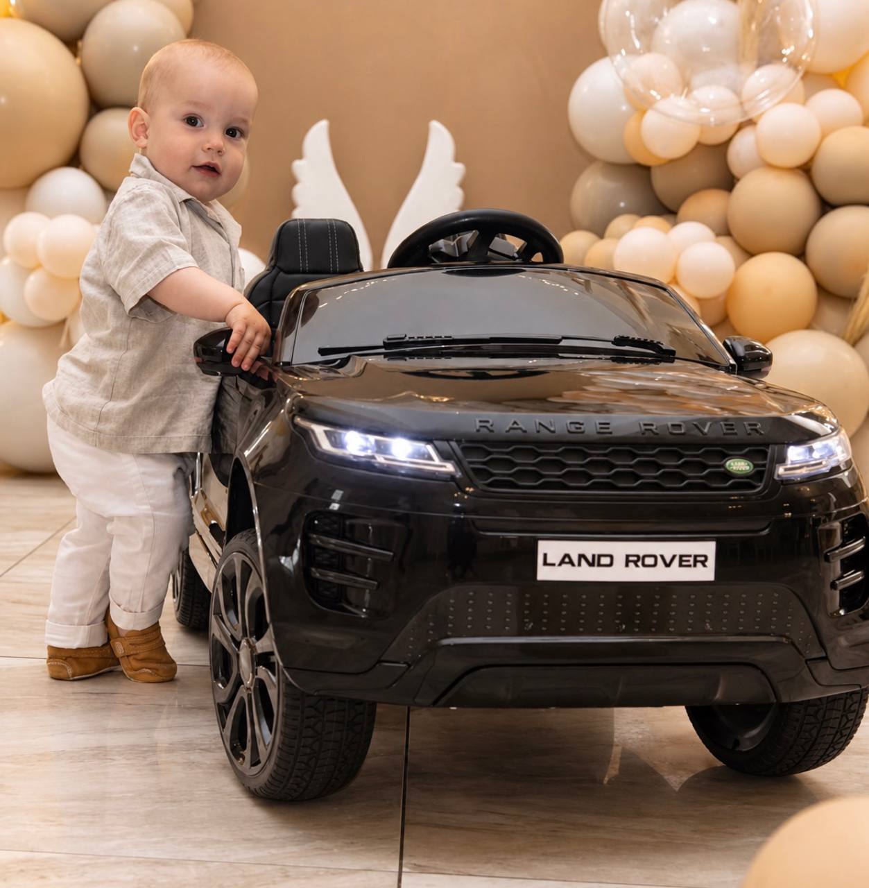 Дитячий електромобіль Bambi Range Rover Evoque (MP4) з додатковими коліщадками та автофарбуванням, чорний