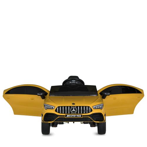 Дитячий повнопривідний електромобіль Mercedes CLA 45 AMG (MP3) з дадатковими коліщатками, жовтий