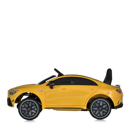 Дитячий повнопривідний електромобіль Mercedes CLA 45 AMG (MP3) з дадатковими коліщатками, жовтий