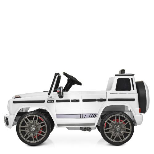 Дитячий електромобіль Bambi Mercedes G63 AMG (MP3) з ручкою для транспортування, білий