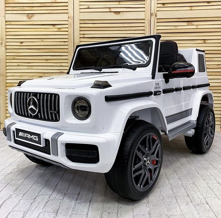 Дитячий електромобіль Bambi Mercedes G63 AMG (MP3) з ручкою для транспортування, білий