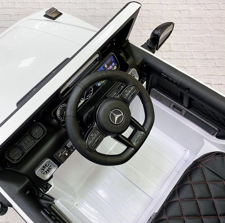 Дитячий електромобіль Bambi Mercedes G63 AMG (MP3) з ручкою для транспортування, білий